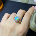 Handmade sterling silver adjustable opal ring showing rose gold, white gold, and yellow gold plated finish options.