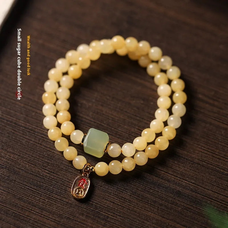 Women's Topaz bracelet with six-word mantra barrel beads and square sugar jade beads