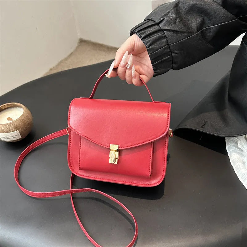 Horizontal square PU leather messenger bag showing document compartment and crossbody strap