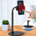 Lazy desktop stand holding a mobile phone on a desk, silicone tube and aluminium alloy construction