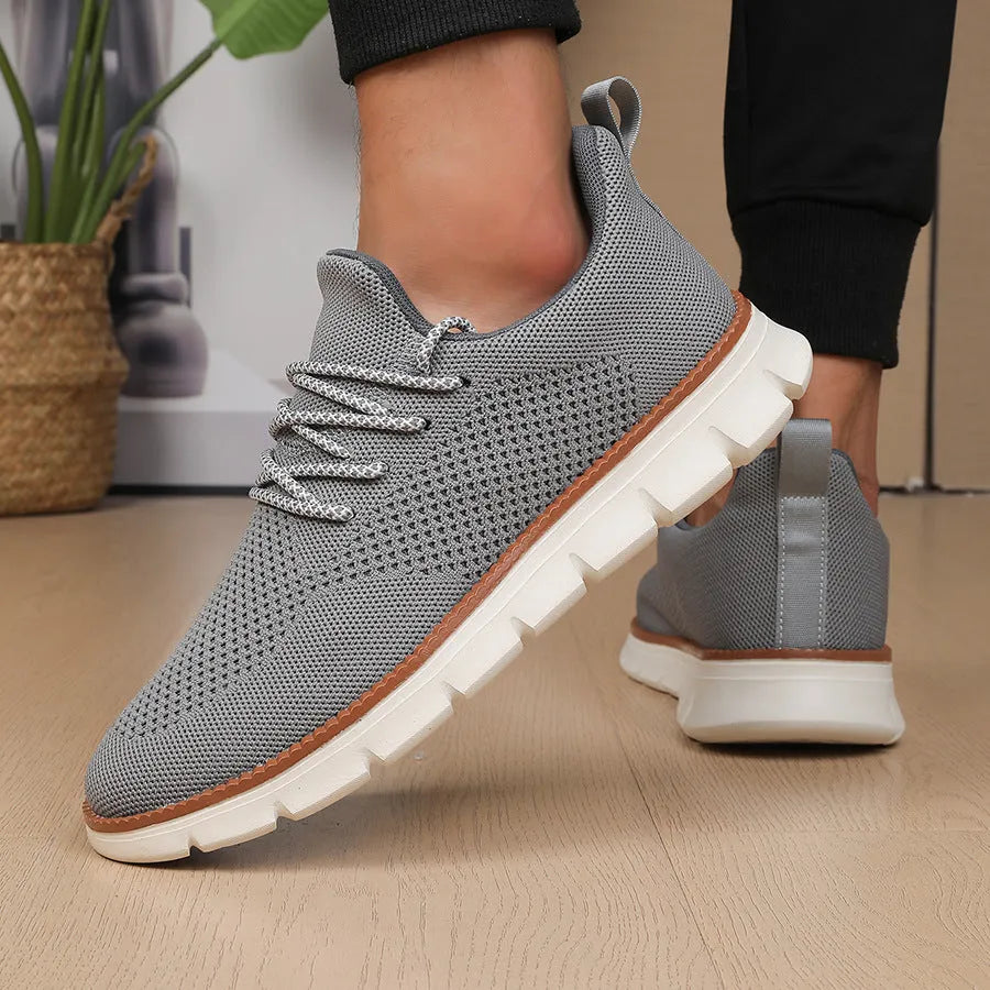 Men's grey mesh sneakers with round toe and shallow collar design