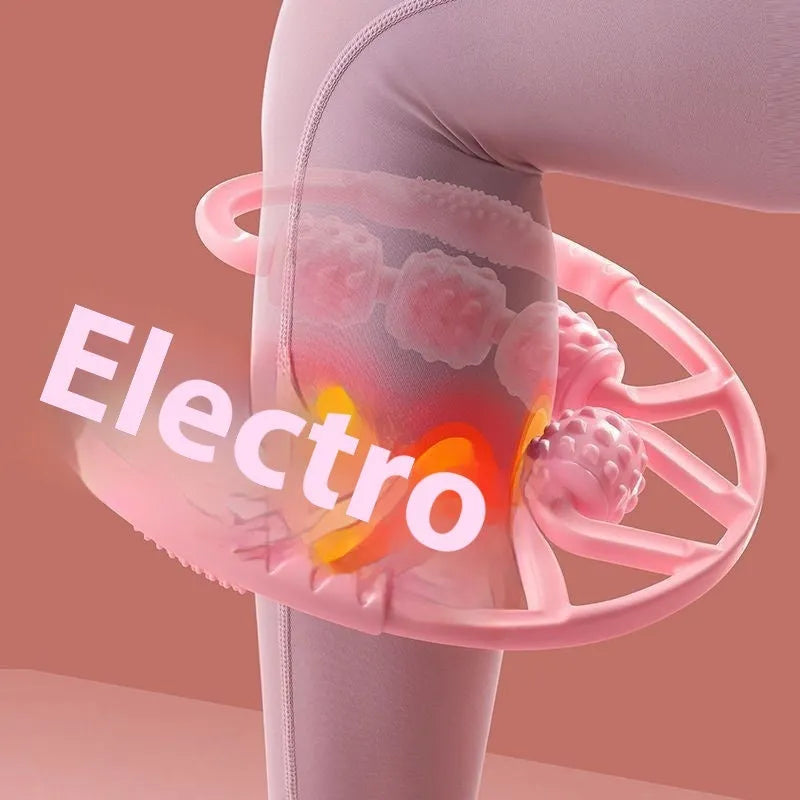 Handheld leg massager roller with multiple wheels in pink or purple on a table.