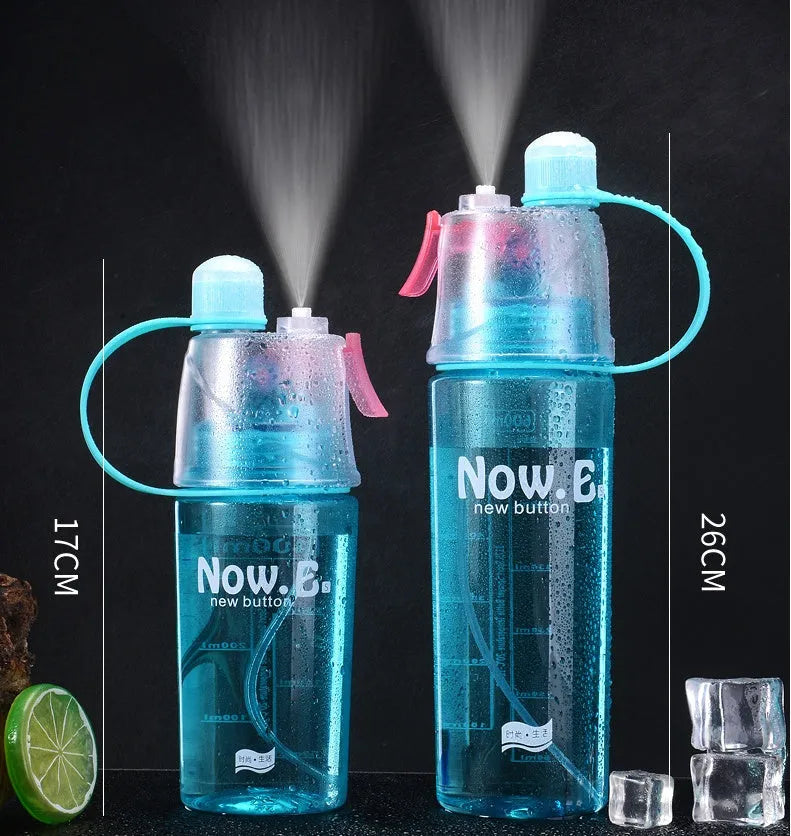 Green portable sports mist spray cup with handle, spray nozzle, and visible water level scale.