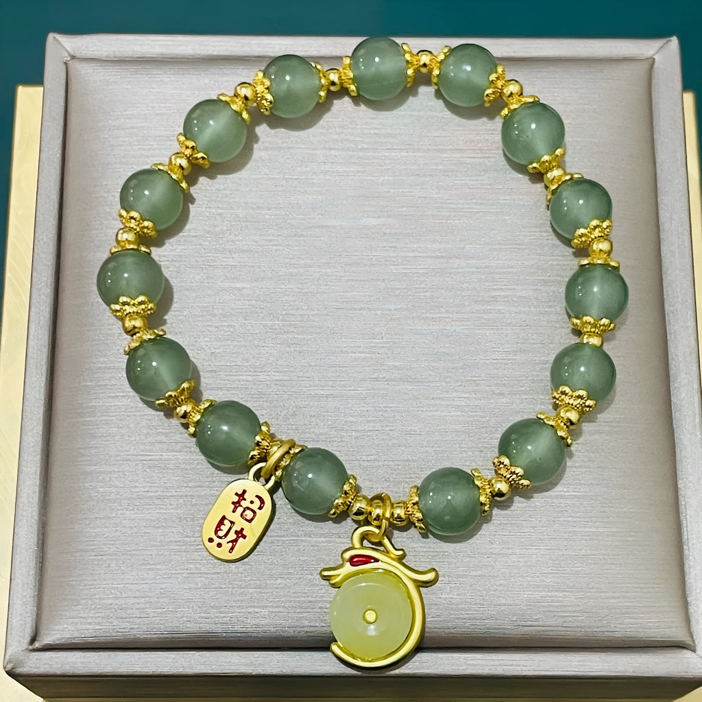 National style glass bracelet with rabbit charm and coloured glaze decoration