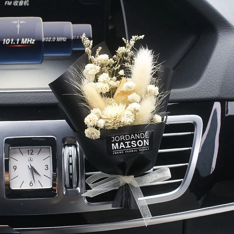 Dried flower car air freshener with natural aroma slices mounted on vehicle air conditioning vent