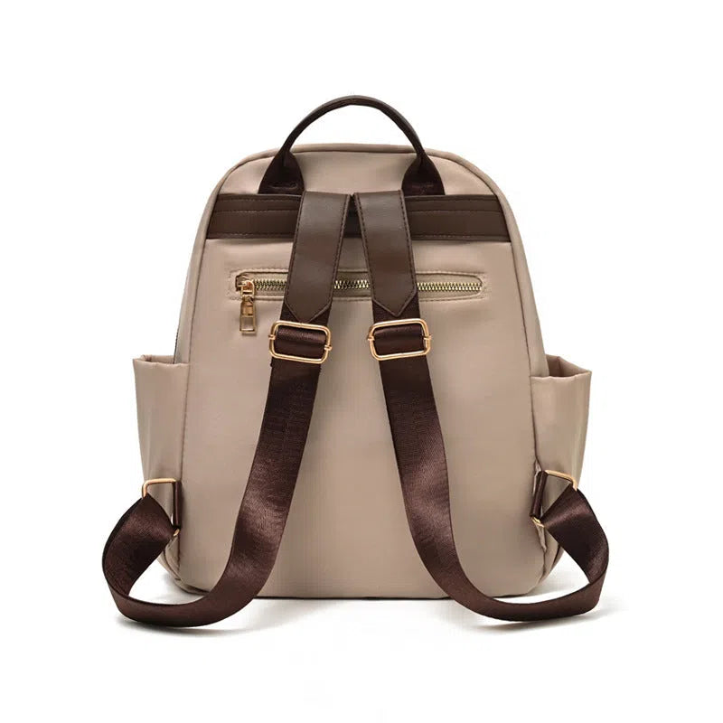 Women's lightweight nylon travel backpack in milk tea colour with large-capacity main compartment
