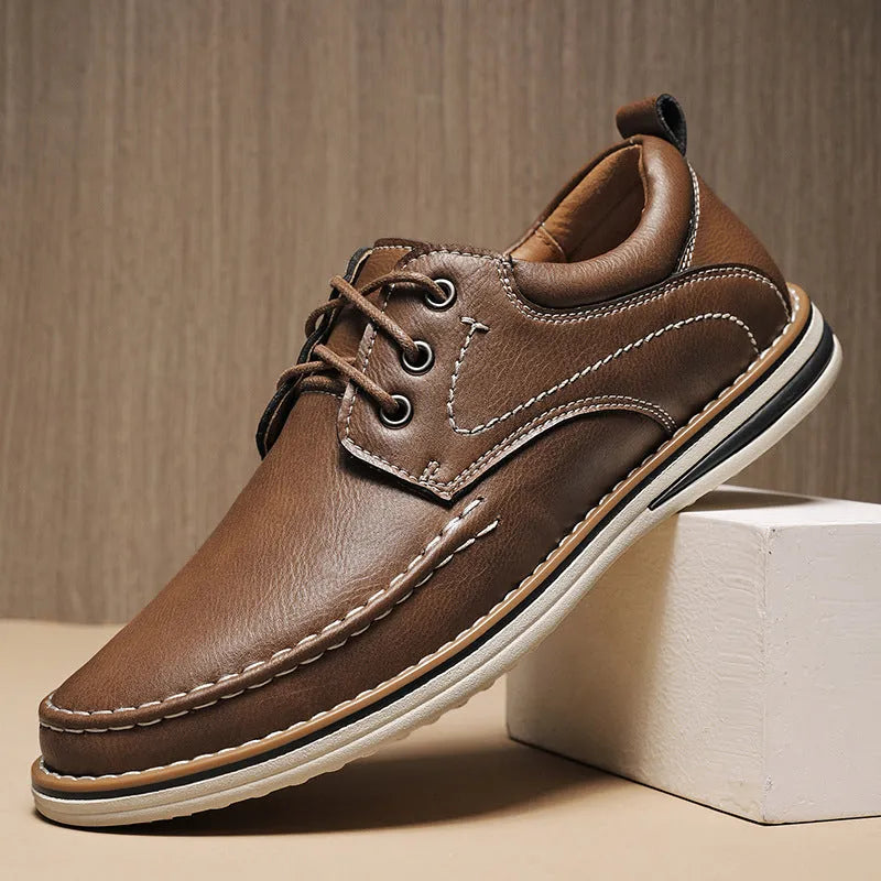 Men's black genuine leather lace-up casual shoes with round toe and stitched sole