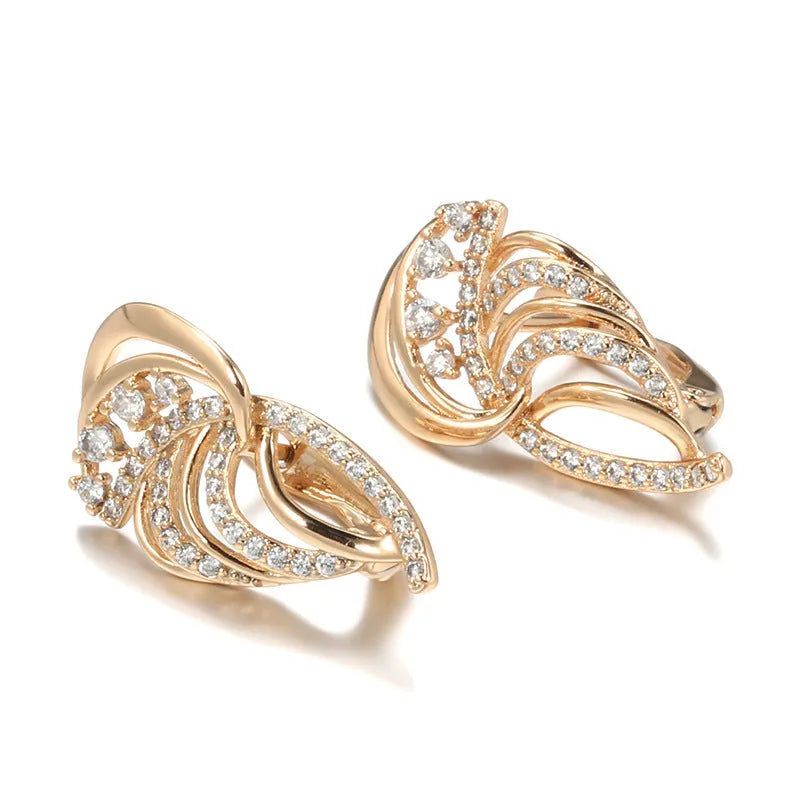 Women's copper ear clips with wing design featuring micro inlaid zircon detailing and gold-plated finish in H0195 colour