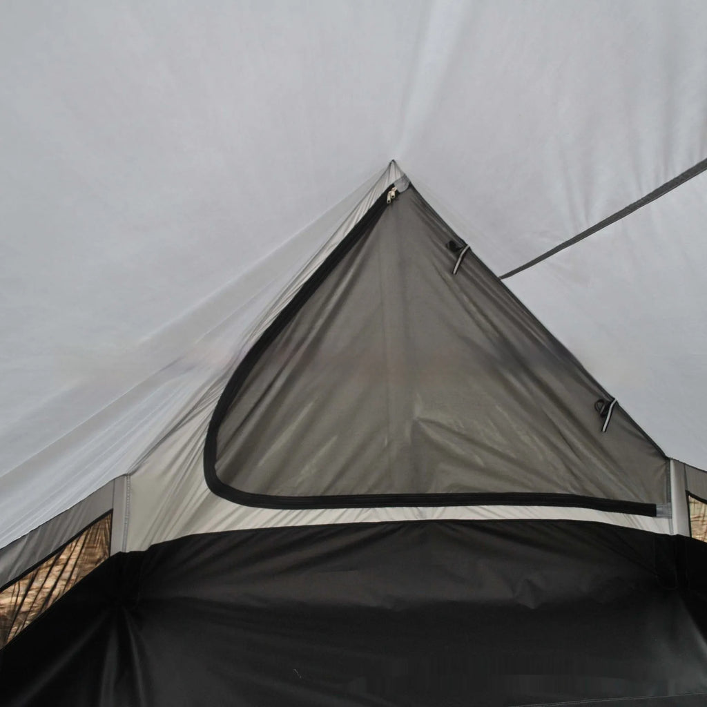 Brown A-line pole-free tent erected with hiking canes showing 2-3 person capacity and waterproof fabric construction