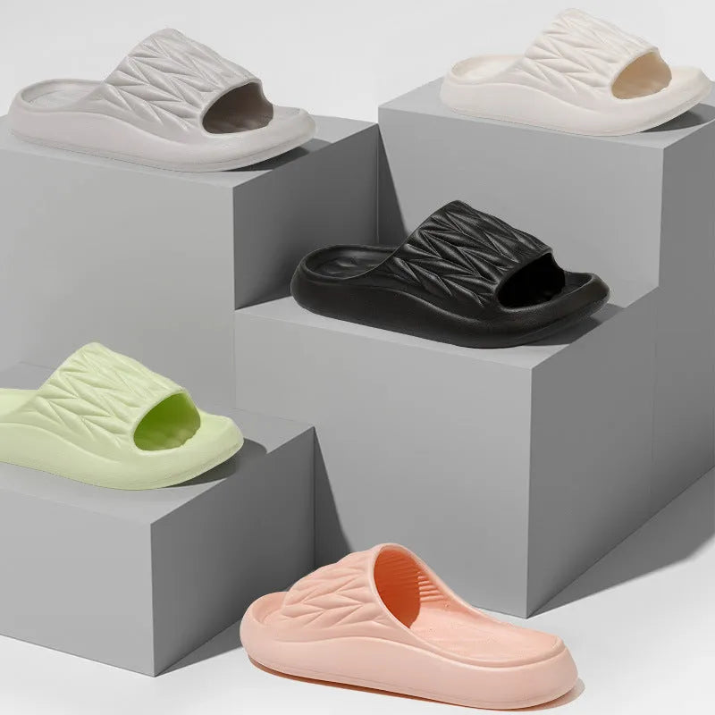 Pair of EVA leaf texture design slippers in multiple colour options on a white background.
