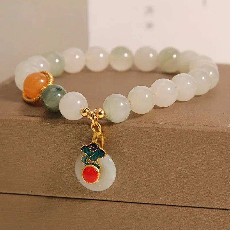 Women's ice jade bracelet with xiangyun peace buckle and pearl decorative elements