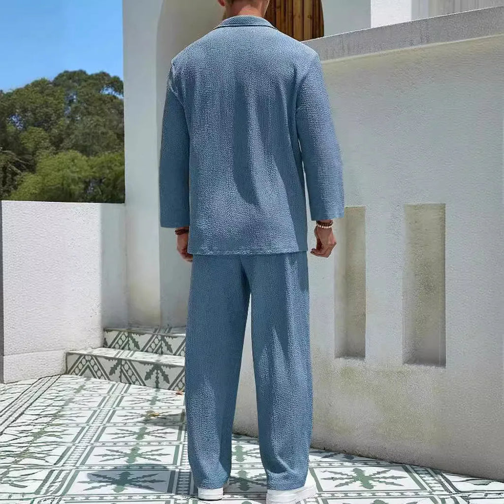 Men's casual shirt and trousers suit in polyester, shown in lake blue, khaki, black, and caramel colour options.