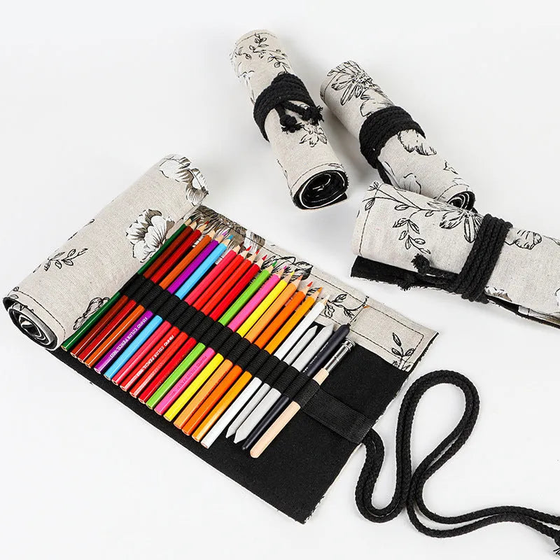 Black peony floral print canvas pencil roll bag open to show multiple tool holes.