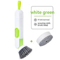 White and red long-handle kitchen brush with liquid dispenser button and two removable brush heads.