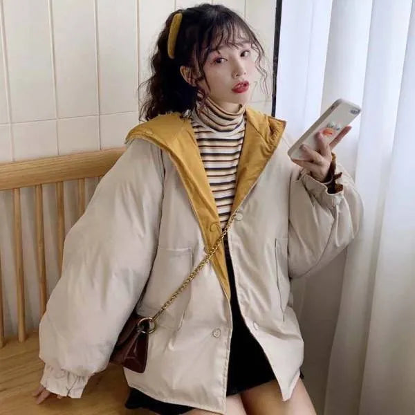 Korean reversible coat made of polyester in apricot colour with pockets and straight cut