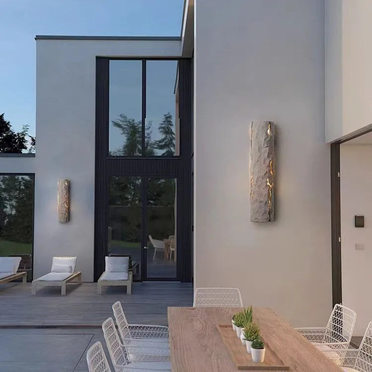 Creative retro rock-like outdoor waterproof wall lamp in model A gray for villa courtyard or garden wall.