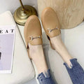 Women's PVC closed-toe half slipper with a buckle, shown in milky white colour.