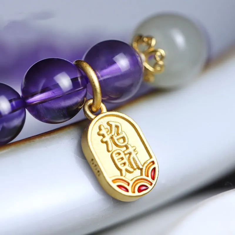 Amethyst colour crystal bracelet with 8mm beads in geometric pattern