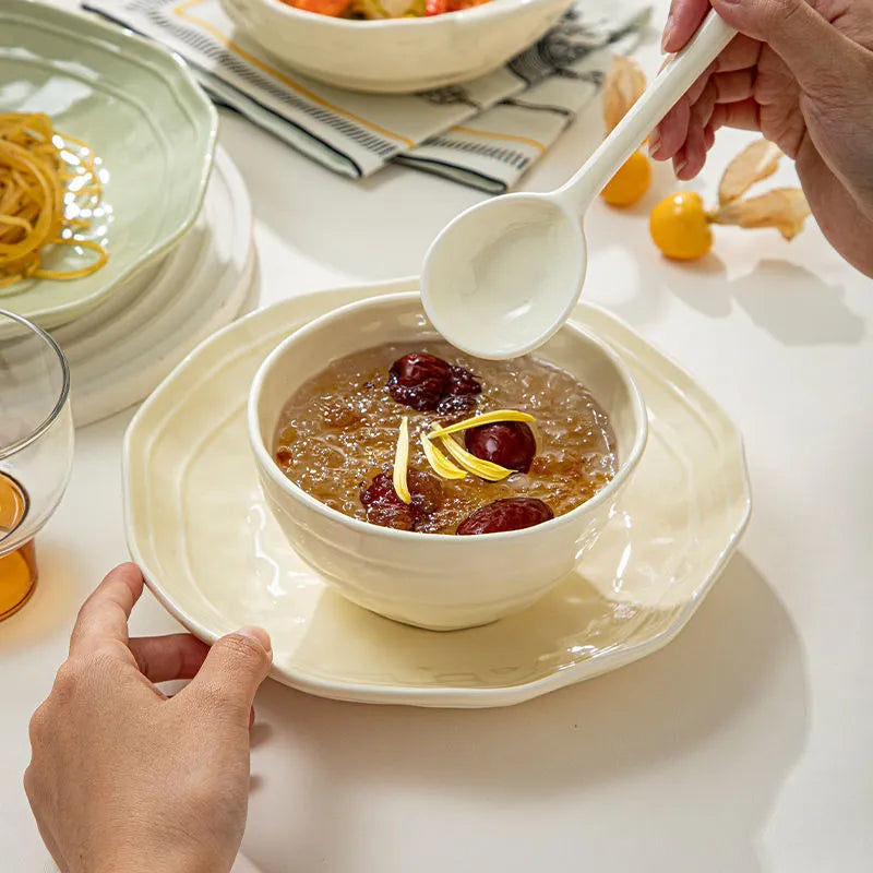 Seven-piece ceramic tableware set in solid colours with simple modern design