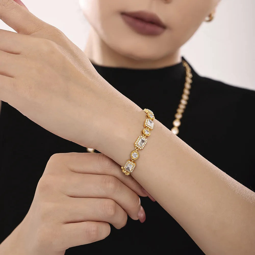 Titanium steel unisex bracelet with square zircon rhinestone inlay, geometric design, gold or steel colour.