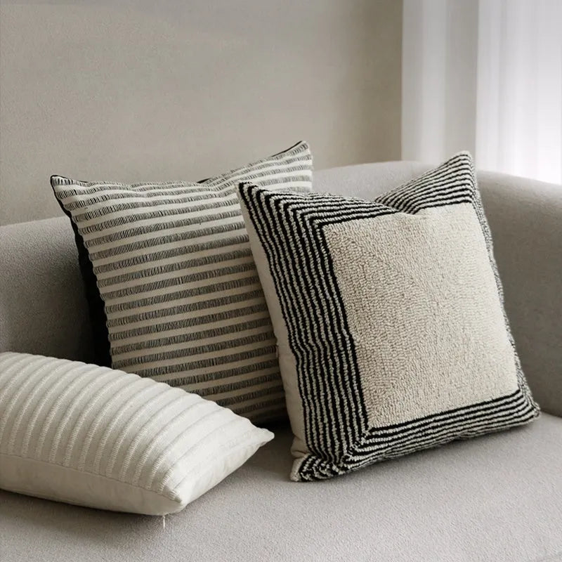 Black and white geometric towel embroidery cushion in 50x50cm square and 30x50cm waist pillow formats for sofa and living room.
