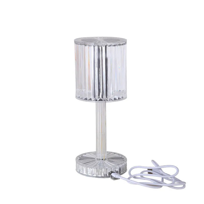 Modern crystal table lamp with touch dimming base and transparent K9 crystal bead lampshade on a nightstand.