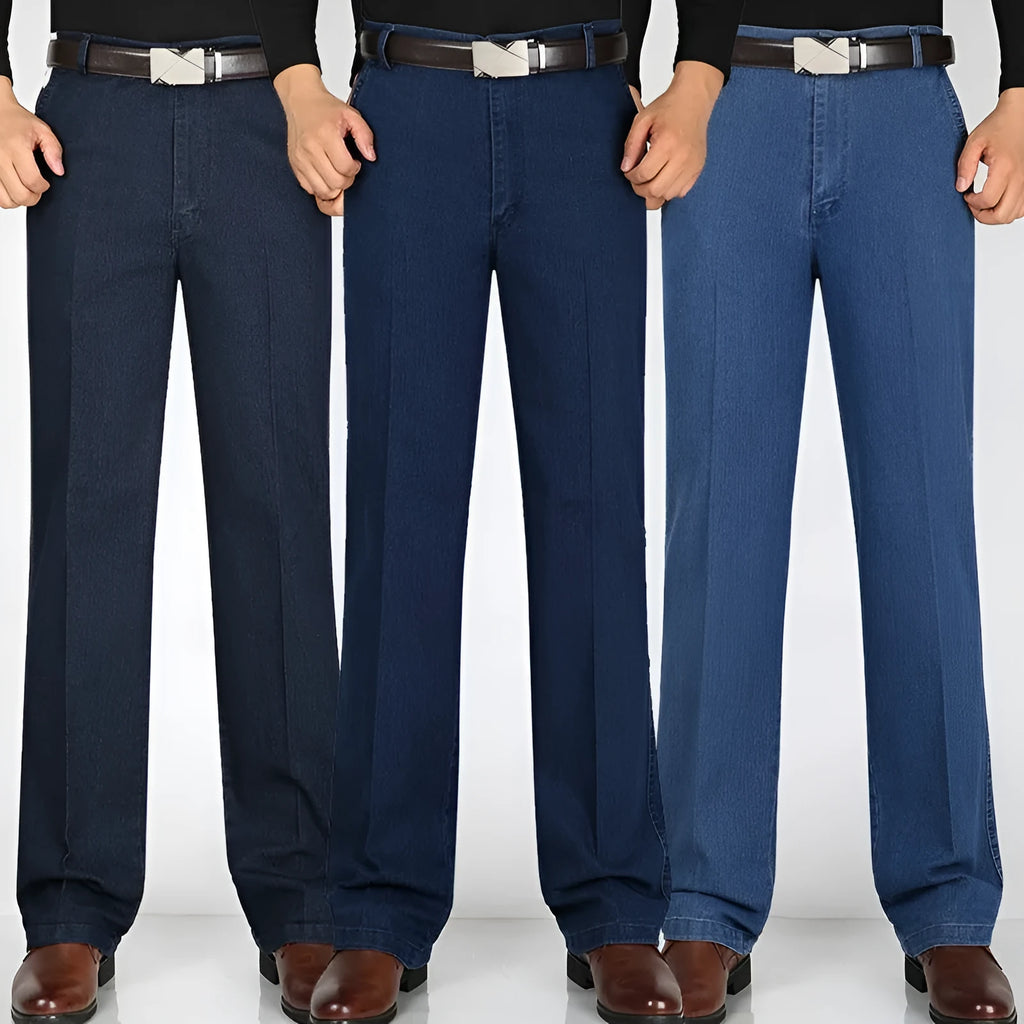 Men's high-waist loose fit blue denim jeans with zipper fly on size chart background