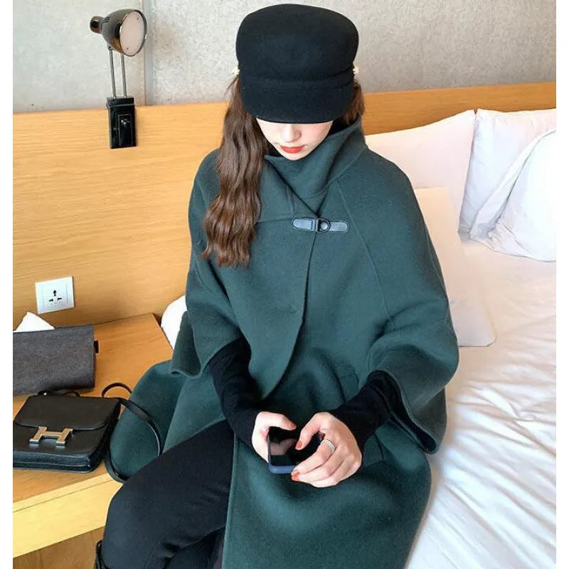 Women's long acrylic coat in oatmeal colour with flight sleeves and 100cm length