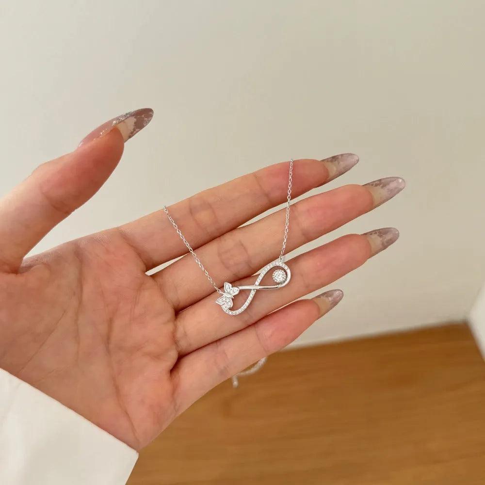 925 silver clavicle chain with mobius bow butterfly pendant set with zircon stones, platinum electroplated finish