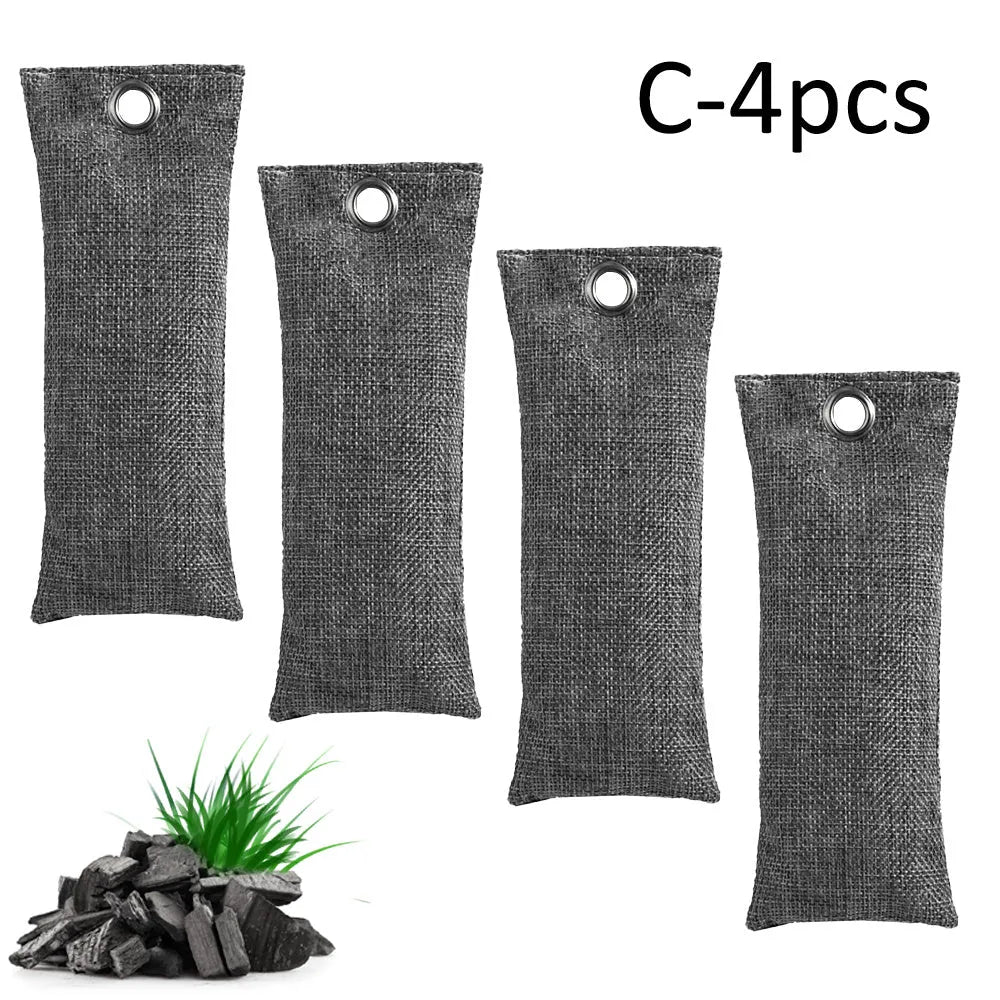 Black, green, grey and blue activated charcoal shoe deodoriser bags measuring 16.5cm.