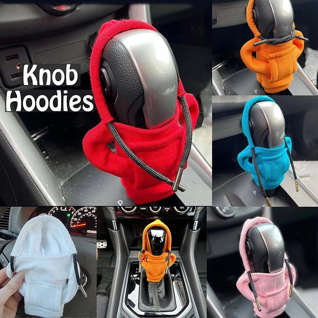 Cloth car gear shift knob hoodie cover in multiple colour options next to a gear lever.