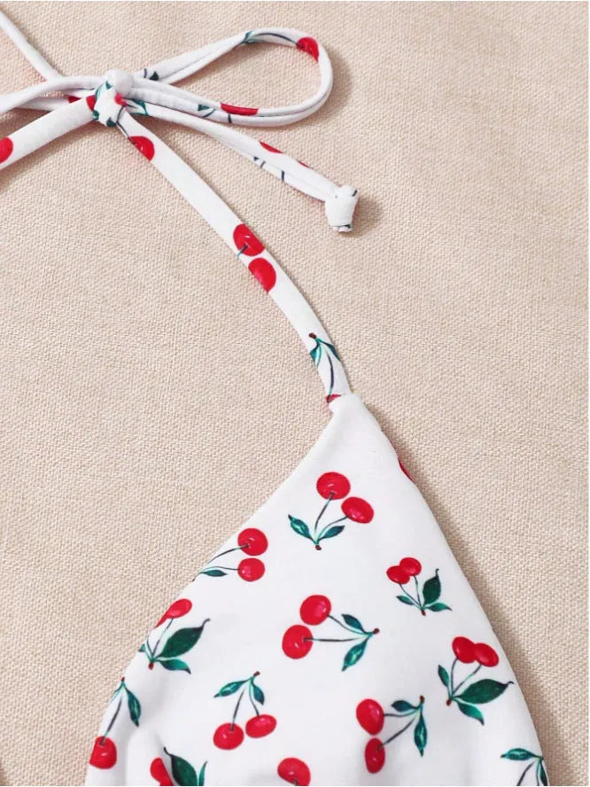 Women's split halter bikini swimsuit in solid colour with adjustable ties