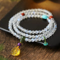 White moonstone crystal 108 prayer beads bracelet in ethnic style for women.