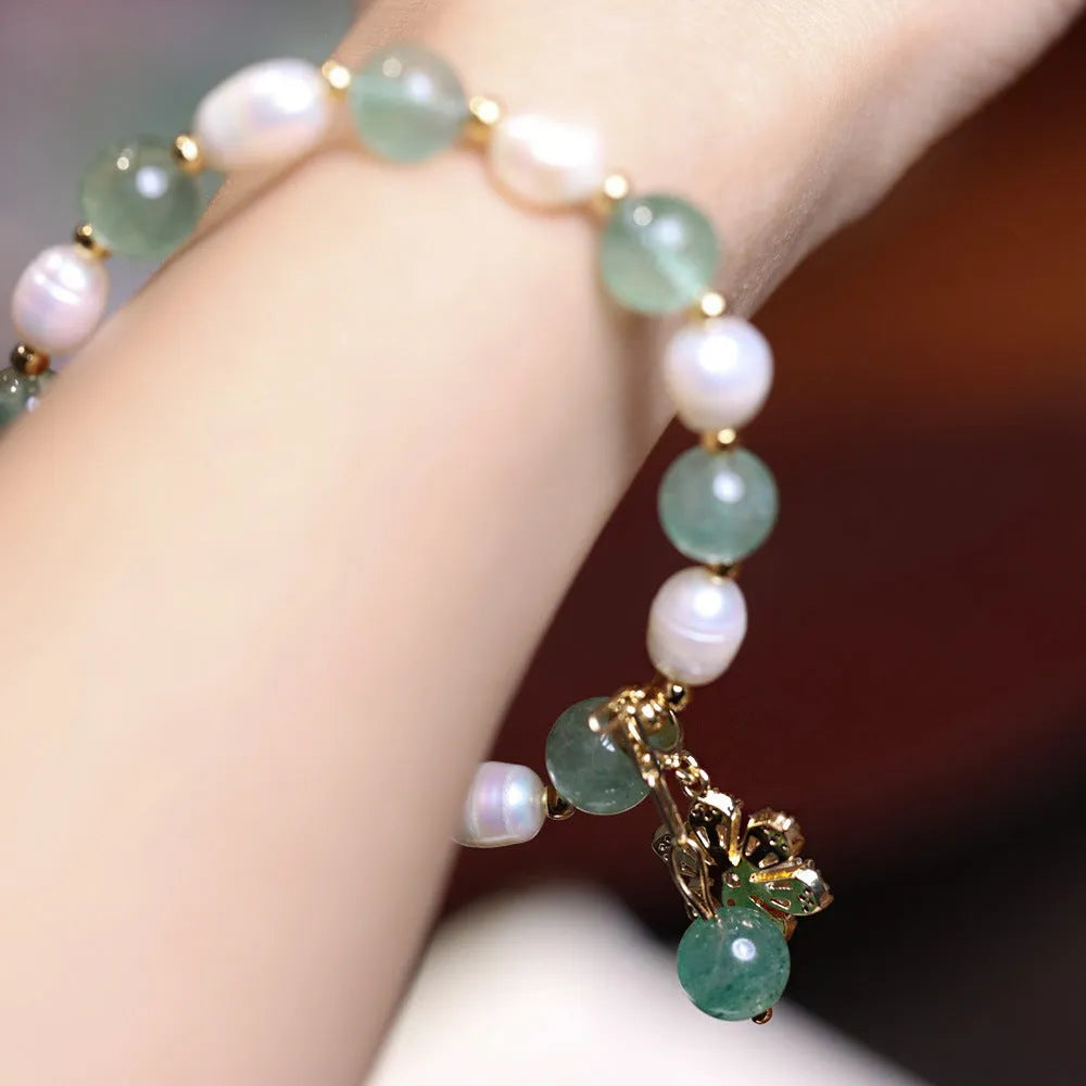 Green strawberry freshwater pearl bracelet with Chinese knot and peace buckle fastening