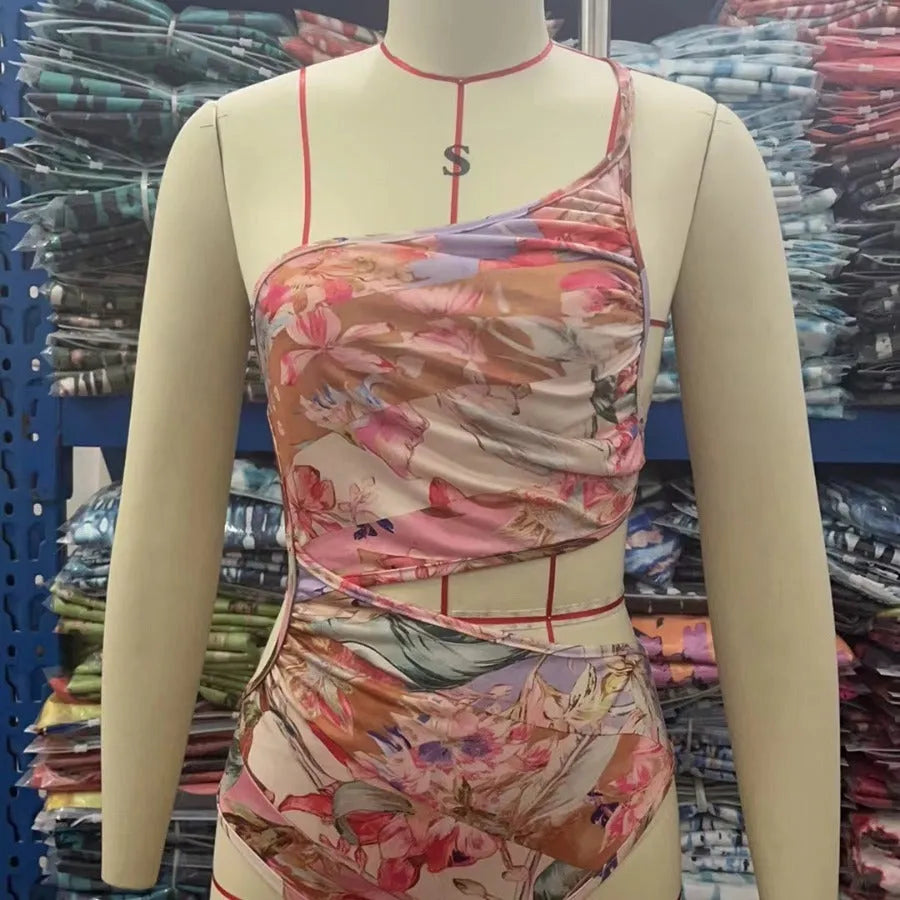 Women's rose gold patterned swimsuit made from polyester fibre in various sizes