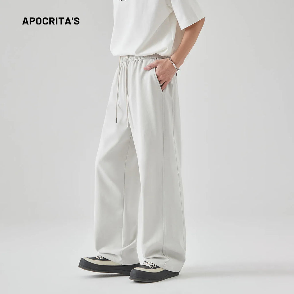 Men's casual straight-leg trousers in grey with a lace-up front and high waist design.