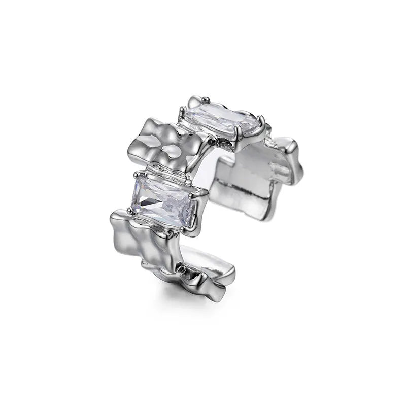 Silver geometric ring with cross zircon detailing and open gemstone setting