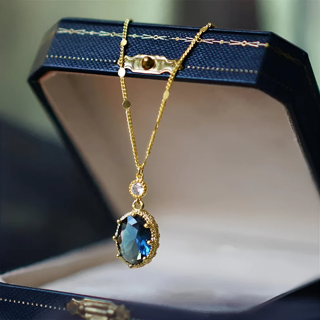 Gold colour geometric pendant on a chain, French retro necklace design