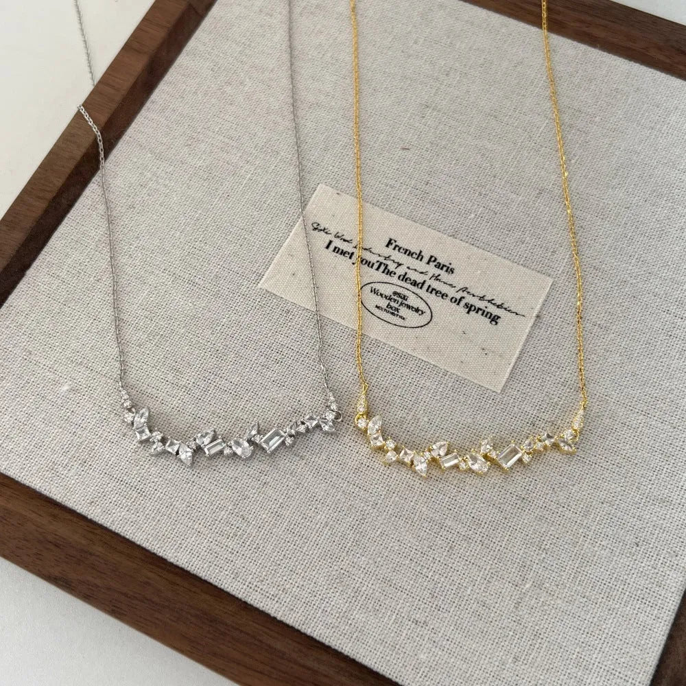 925 silver geometric zircon irregular necklace platinum finish on display with chain and pendant detail