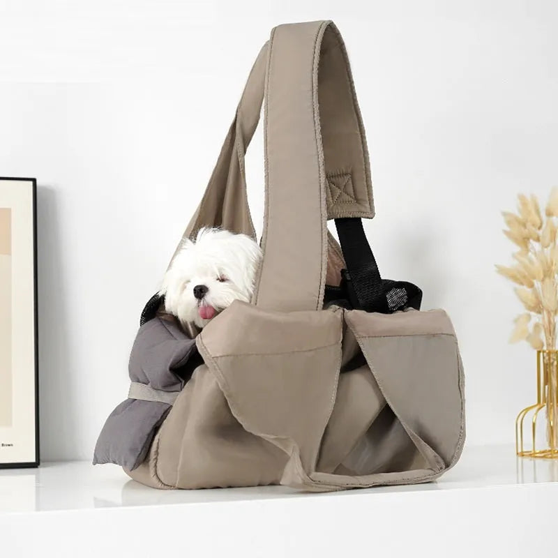 Apricot cloth pet carrier handbag for small dogs or cats, showing handle and breathable fabric.