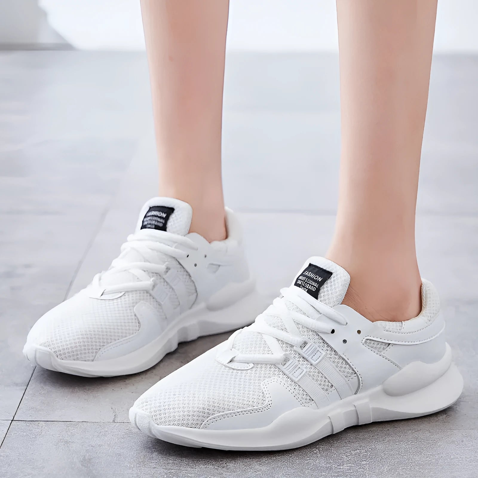 Low-top mesh sneakers with hollow-out design and round toe in various colour options