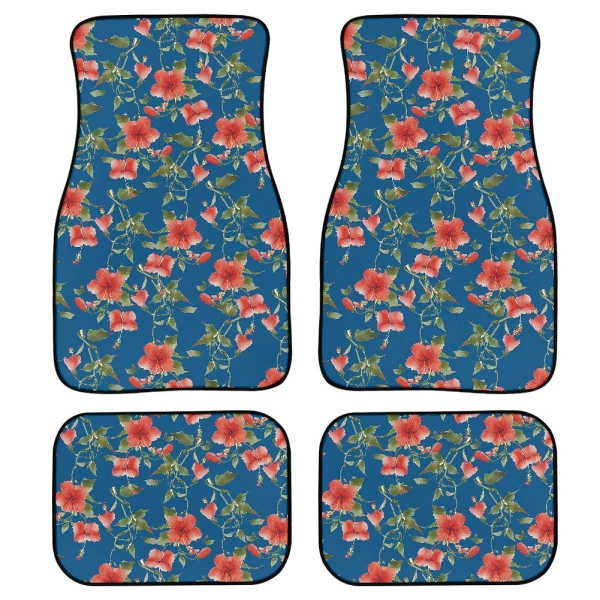 Four-piece set of black printed rubber car floor mats with textured surface.
