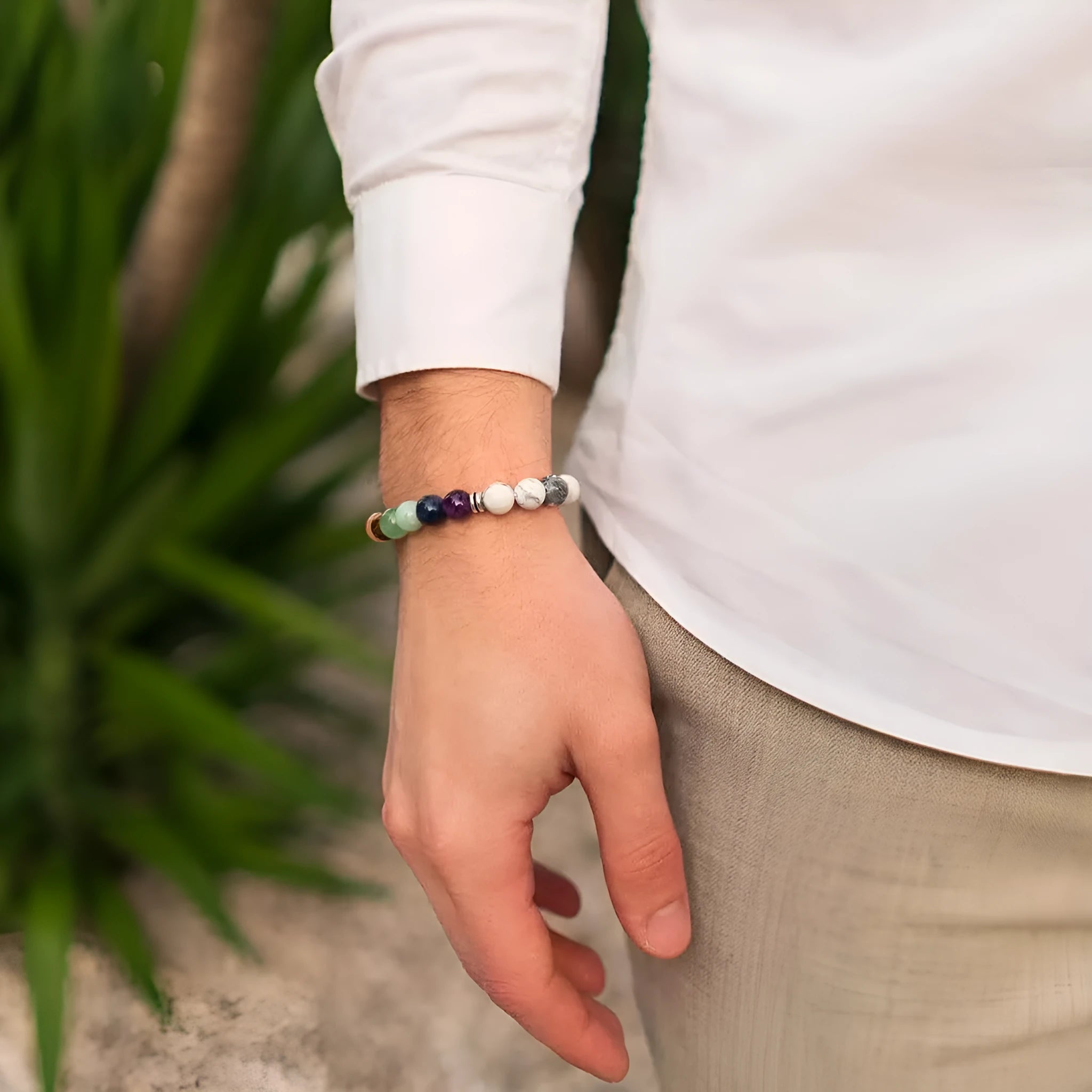 Flat knot braided women's bracelet made from hand-woven aquamarine and coloured stone beads