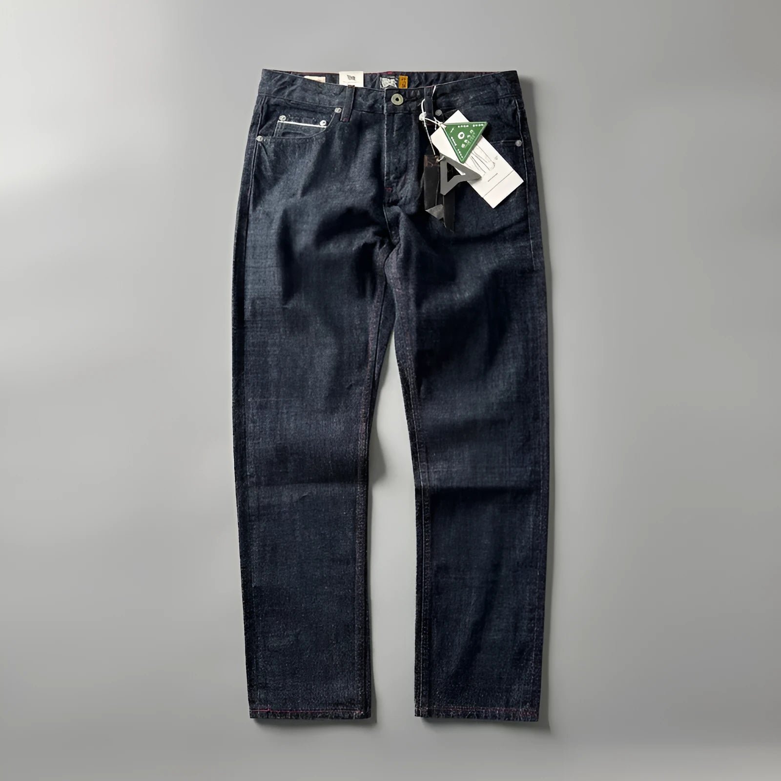 Men's straight leg denim jeans in primary colour showing mid waist fit and classic American retro style.