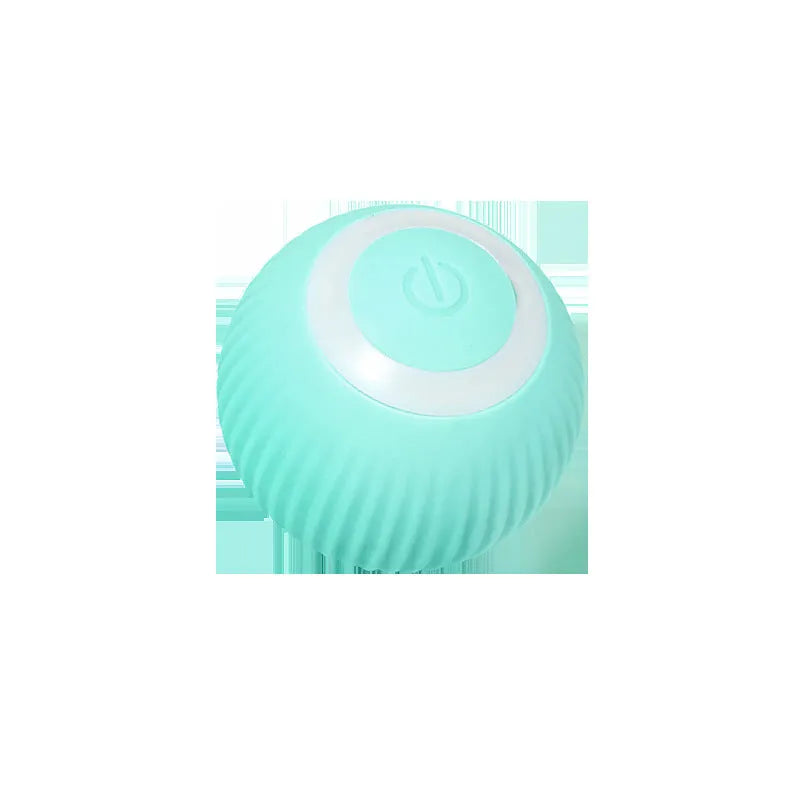 Green automatic rotating ball cat toy with intelligent obstacle avoidance, shown on a hard floor.