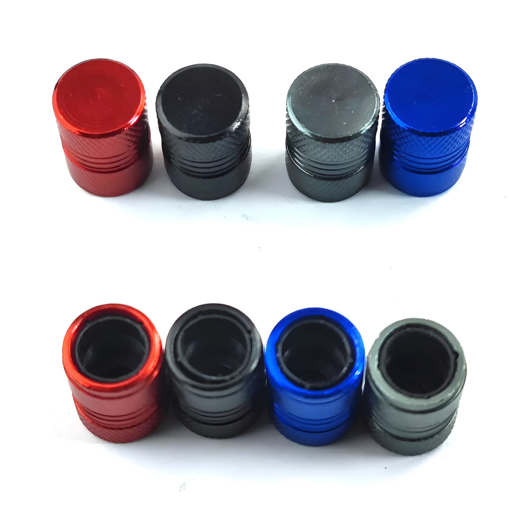Aluminium car tyre valve cover in black, 17mm length, on a tyre valve stem