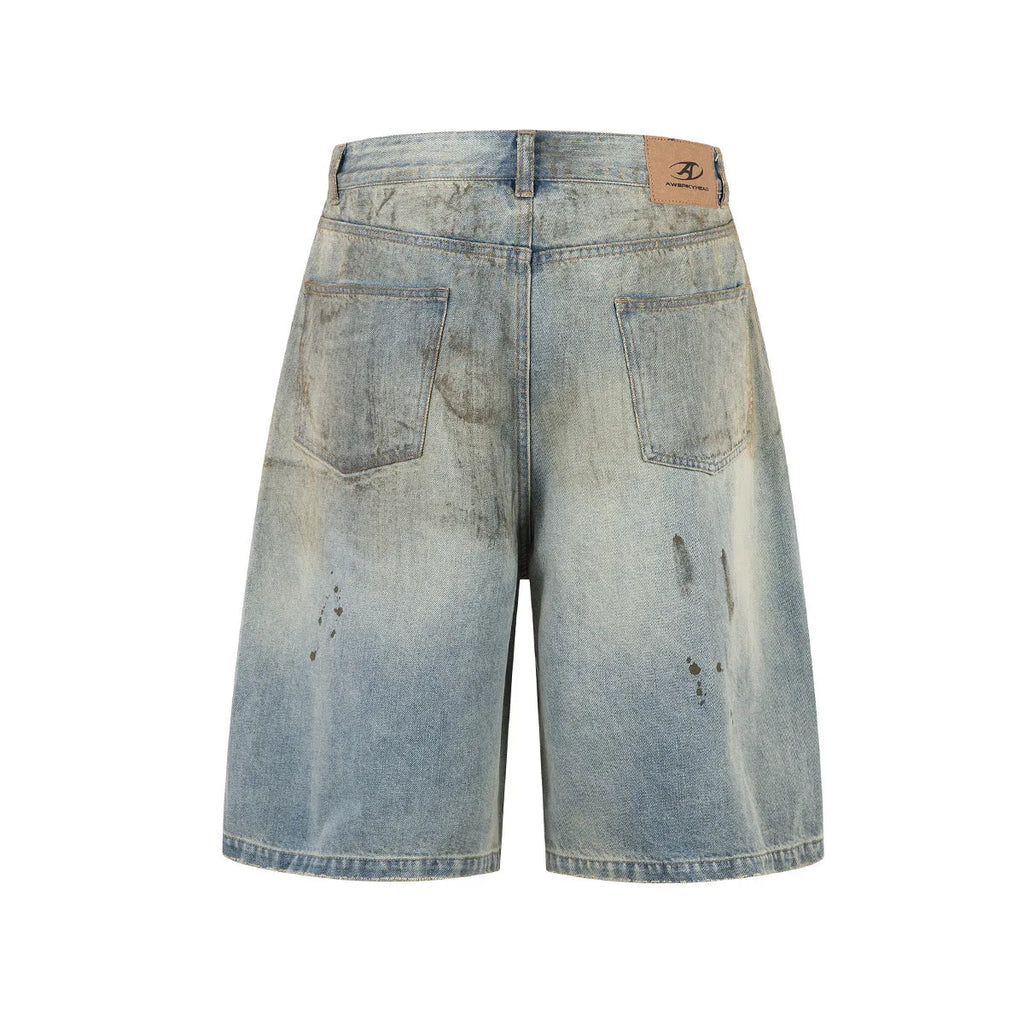 Washed blue women's cropped denim straight-leg trousers with zipper fly on a hanger