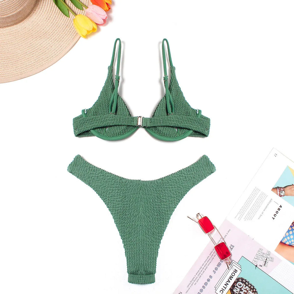 Green women's bikini suit with ruffle detail and briefs bottom