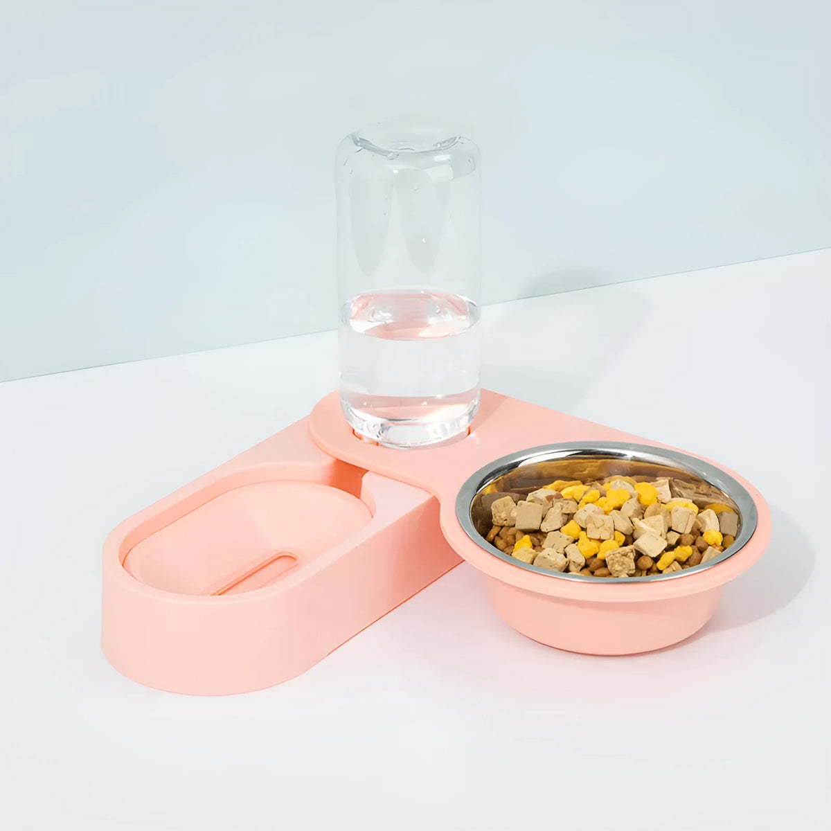 Automatic cat bowl feeder and drinking fountain with water dispenser in pink colour