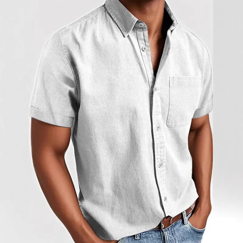 Men's solid colour short-sleeved polo shirt with a classic collar and a single chest pocket.
